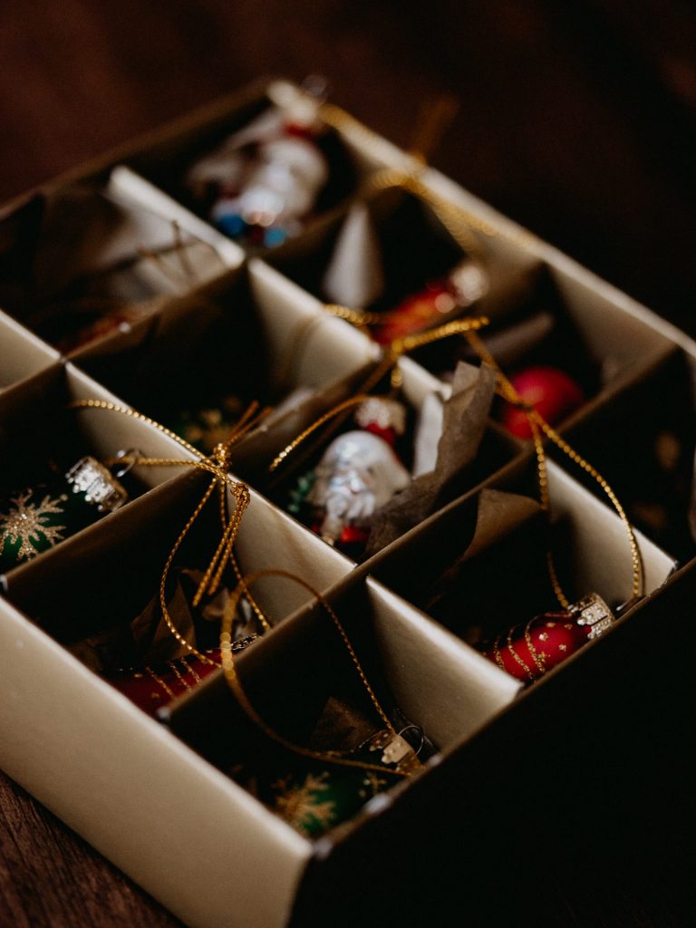 Christmas décor ideas for your kitchen, box of Christmas decorations placed on the table